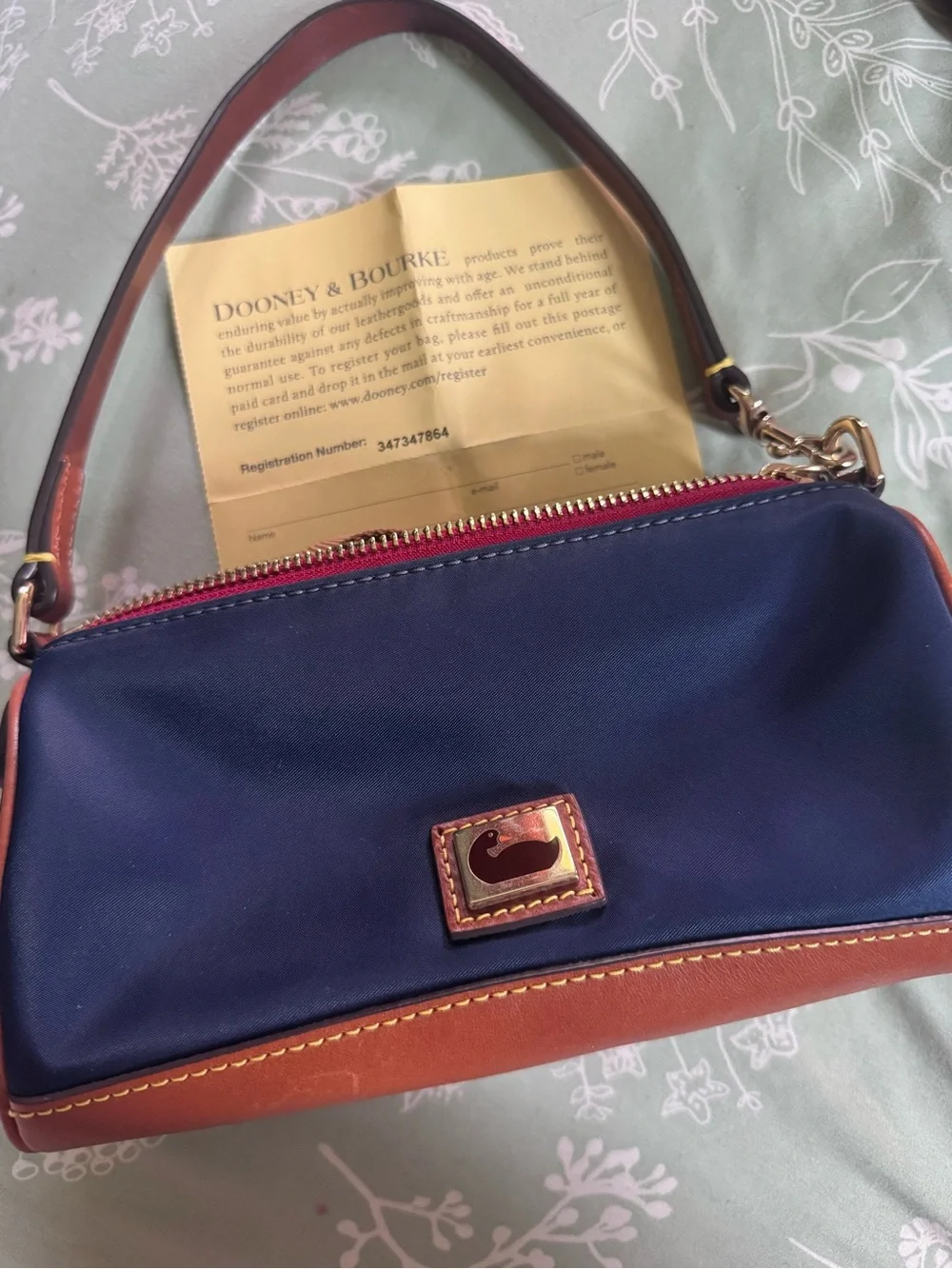 Dooney & Bourke Navy and Brown Leather-Trim Wristlet with Pink Zip
